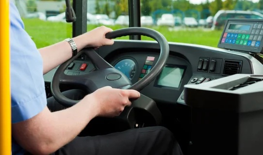 depositphotos 79105270 stock photo driver sitting in his bus